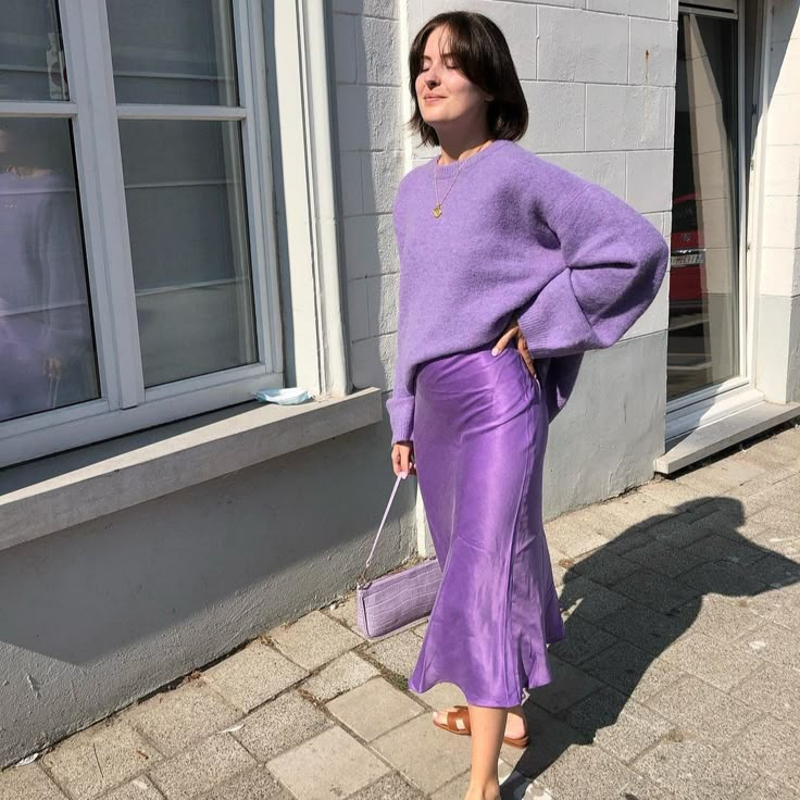 Formal wear
Womens outfit
Clothing 
Satin skirt
Sweater
Spring outfit Hermes Sandals Aesthetic, Satin Slip Dress Outfit Casual, Lavender Skirt Outfit, Slip Dress Outfit Fall, Purple Satin Skirt, Paris Inspired Outfits, Purple Skirt Outfit, Sandals Aesthetic, Silk Skirt Outfit