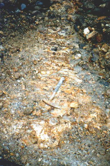 an image of a dirty area with rocks and debris