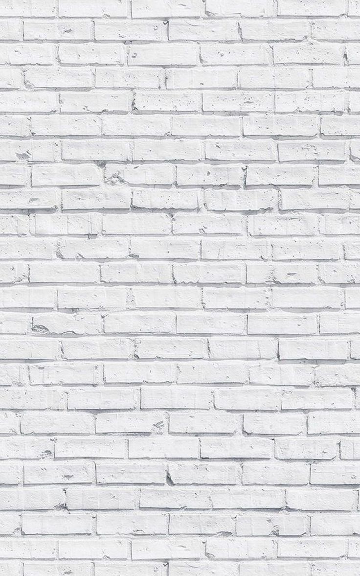 a white brick wall with no mortars or mortars on the top and bottom