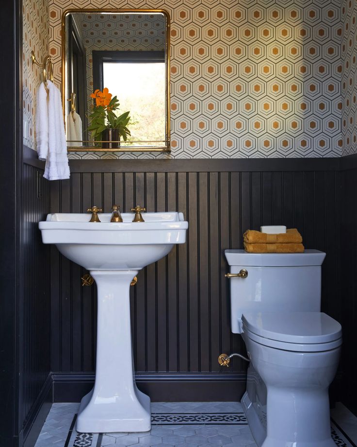 10 Clever Ways to Make a Small Bathroom Look Larger - This Old House Styling A Pedestal Sink, Small Powder Room Pedestal Sink, Pedestal Sink Cabinet Diy, Small Vintage Bathroom Sink, Bathroom Remodel Pedestal Sink, Pedastill Sink Bathroom, Pedestal Sink Half Bathroom, Pedastill Sink, Sink Pedestal Ideas