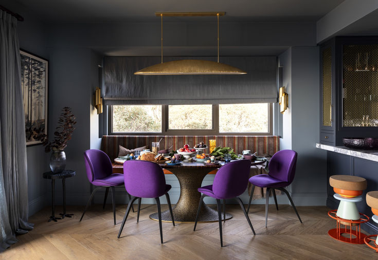 This extravagant alpine apartment designed by Kate Walker is cocooned in colour with a hotel feel. Tap the link now to take a full tour. Purple Upholstered Chair, Kate Walker, Apartment Dining, Banquette Seating, Dining Nook, Luxury Holidays, Royal Purple, Banquette, Apartment Design