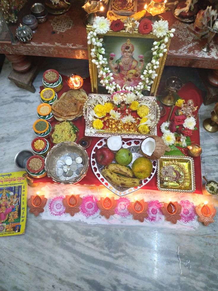 there is a small shrine with food on the table