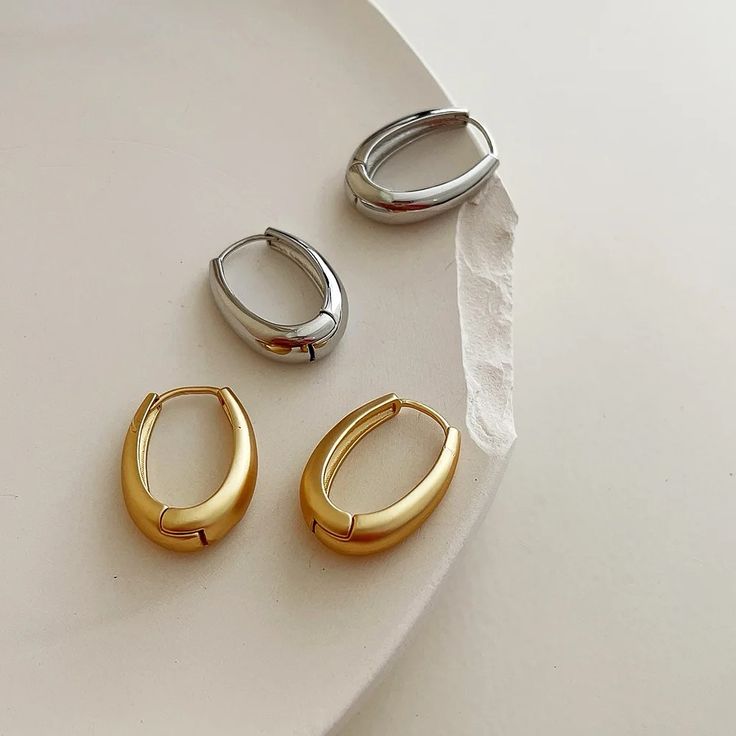 Our best selling geo oval hoops have been restocked! Be First, Silver And Gold, Color Options, Hoop Earrings, Handmade Gifts, Unique Jewelry, Trending Outfits, Silver, Gold