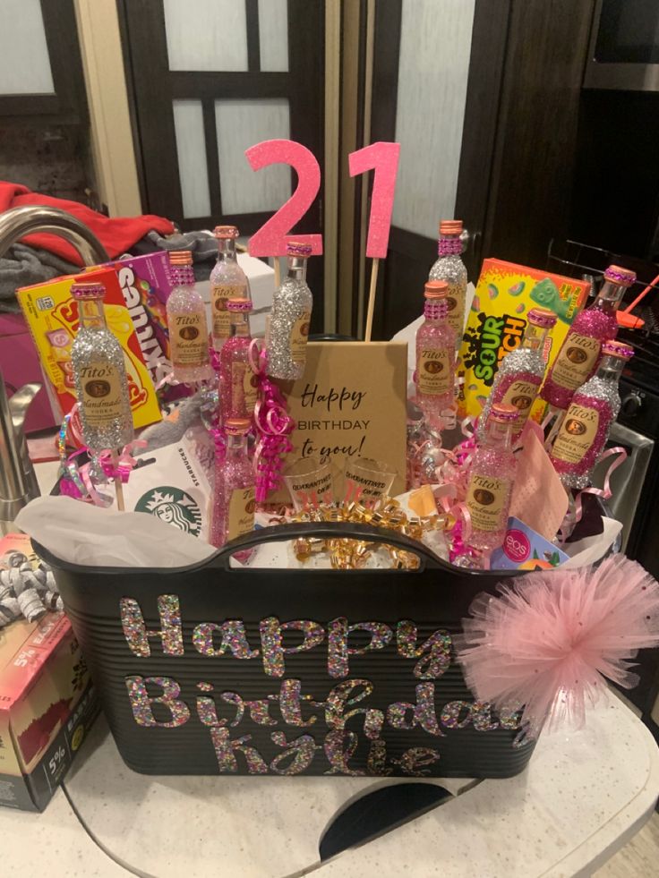 a birthday gift basket is displayed on a table