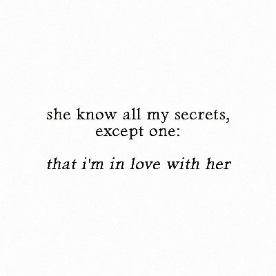 the words are written in black and white on a paper sheet that says she know all my secrets except one that i'm in love with her