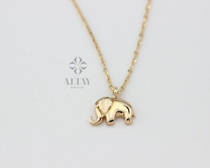 ABOUT PRODUCT  This 14K Gold Elephant Necklace is suitable gift for girlfriend, mom and her. You can even buy as a birthday gift for your friends or anniversary gifts, If you want to add a special note we can write for you and put to inside of package. We manufacture our jewelry pieces with carefully and after production we double checking in quality control department. Our main idea is keep our items for daily wearing especially for minimalist jewelry pieces. 14K Gold Elephant Necklace, Tiny El Gold Pendent Set, Elephant Necklace Gold, Pendent Set, Gold Pendent, Baby Elefant, Elephant Pendant Necklace, Elephant Ring, Tiny Elephant, Gold Elephant