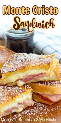 grilled cheese and ham sandwich on a cutting board