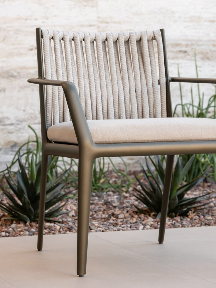 a chair sitting on top of a cement ground