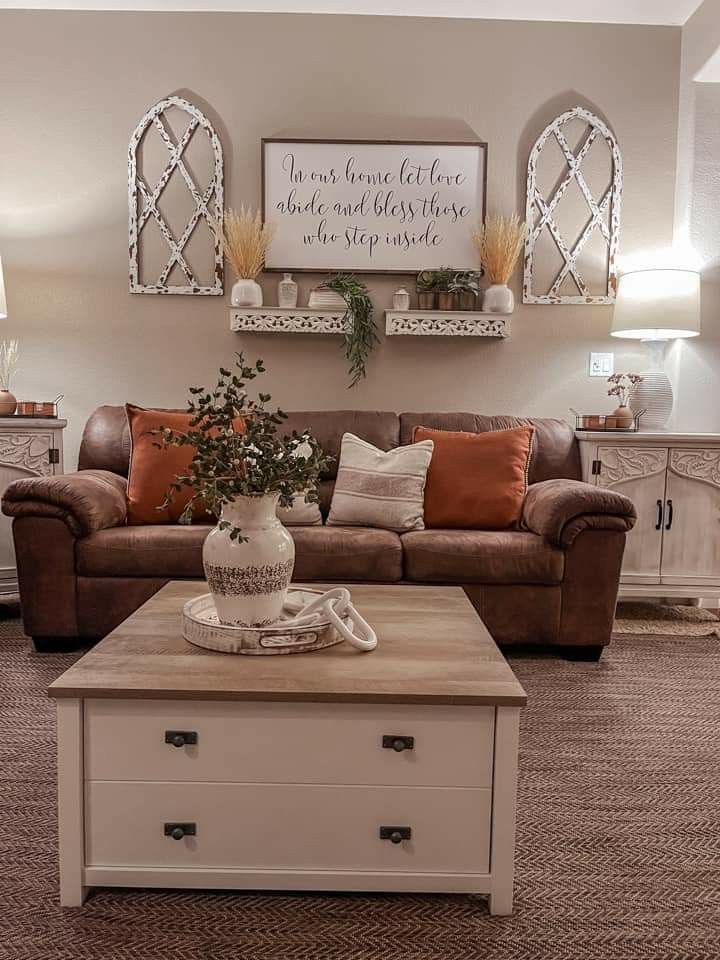 a living room with two couches and a coffee table in front of the couch