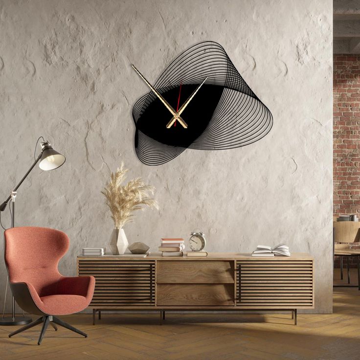 a living room with a clock on the wall next to an orange chair and table