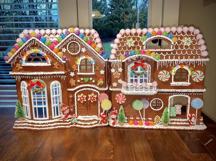 a large gingerbread house decorated with candy and candies