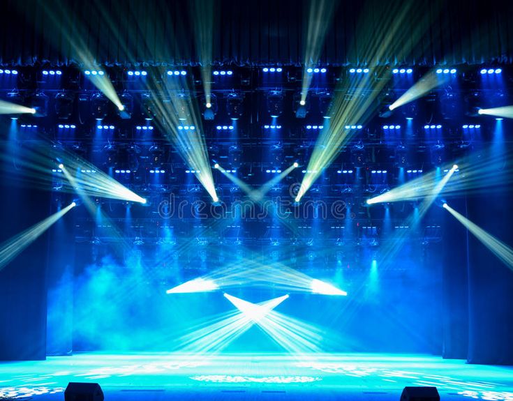 an empty stage with lights and spotlights in the dark stock photo - 957982