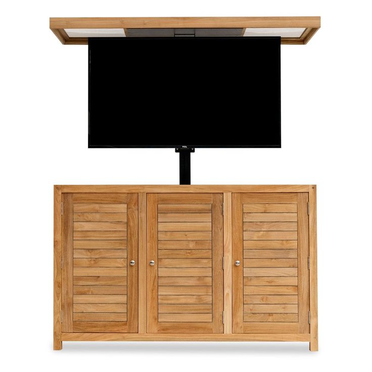 a television on top of a wooden cabinet