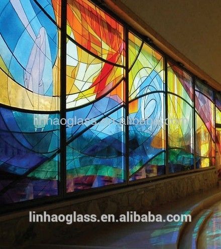 a large stained glass window in a building