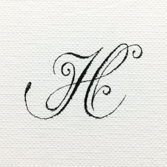 the letter h is made up of black ink