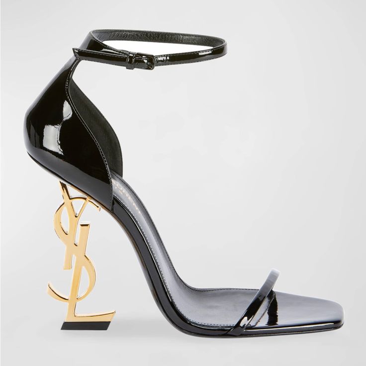 These Eye-Catching Ankle-Strap Sandals Feature A Unique Interlocking Ysl Logo Heel, Making A Bold Statement With Every Step. Condition: Never Worn Brand: Saint Laurent Size: 39 Material: Shiny Patent Leather Heel: 4.3" Golden Ysl Heel Design: Elongated Square Open Toe Style: D'orsay Silhouette Strap: Adjustable Ankle Strap Interior: Leather Lining Sole: Leather Outsole Extras: Includes Dust Bags Ysl Sandals, Dr Shoes, Ysl Heels, Yves Saint Laurent Shoes, Ysl Shoes, Saint Laurent Shoes, Ankle Strap Pumps, Strap Pumps, Patent Leather Heels