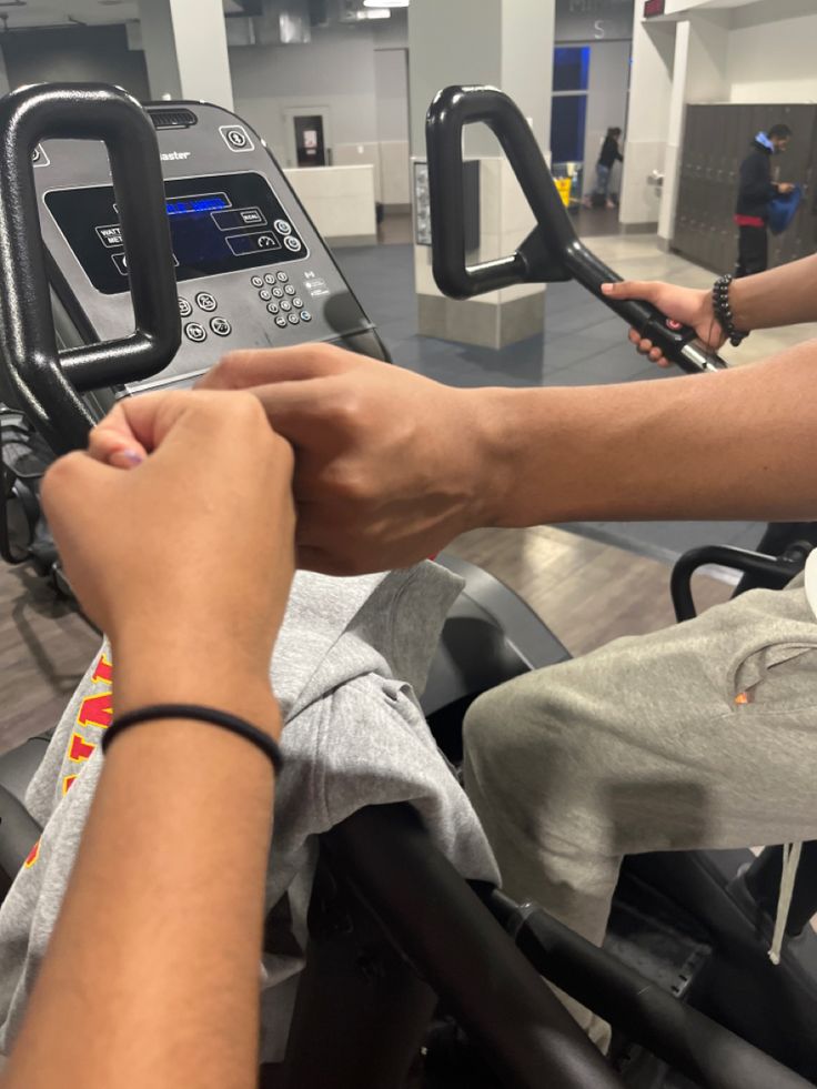 a person on a stationary bike in a gym