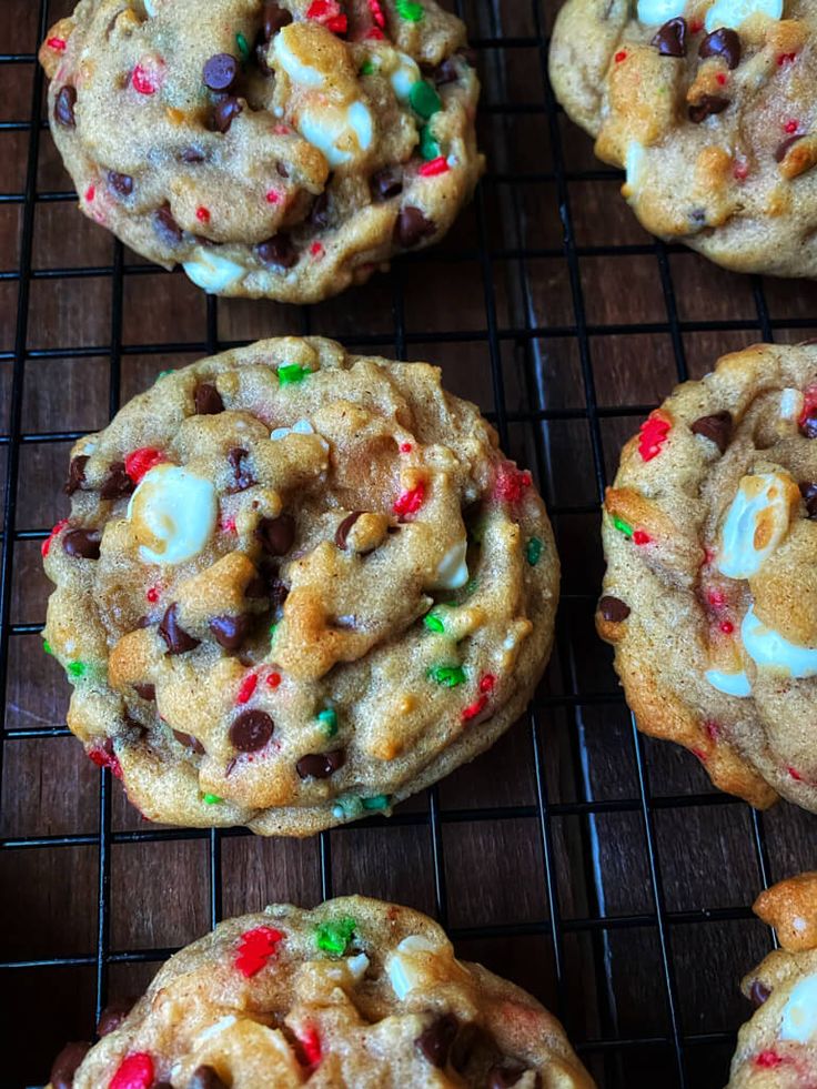 chocolate chip cookies with candy and marshmallows on a cooling rack