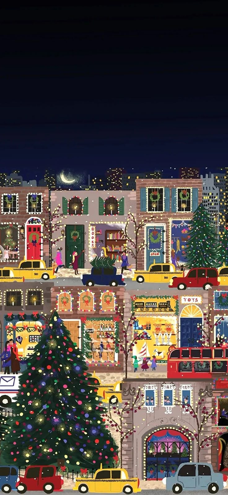 a large christmas tree in front of a building with cars parked on the street at night