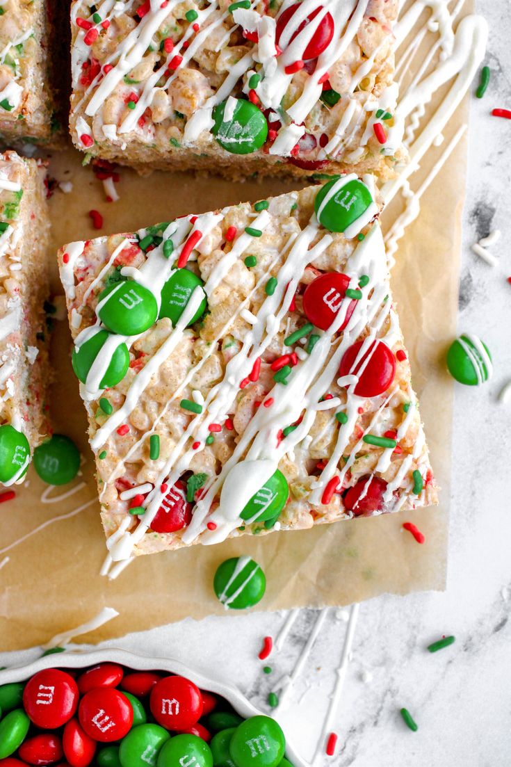 christmas rice krispy kreme bars with white frosting and candy canes