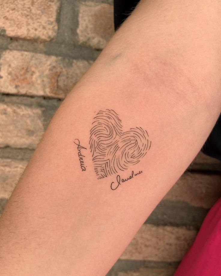 a woman's arm with a tattoo on it that says, i love you