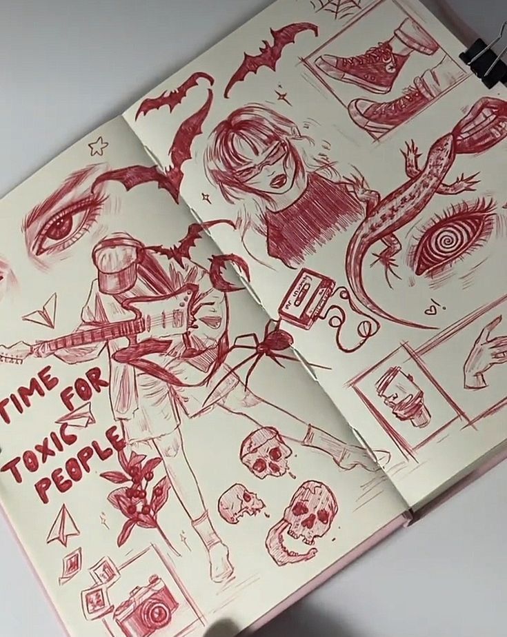 an open book with some drawings on it