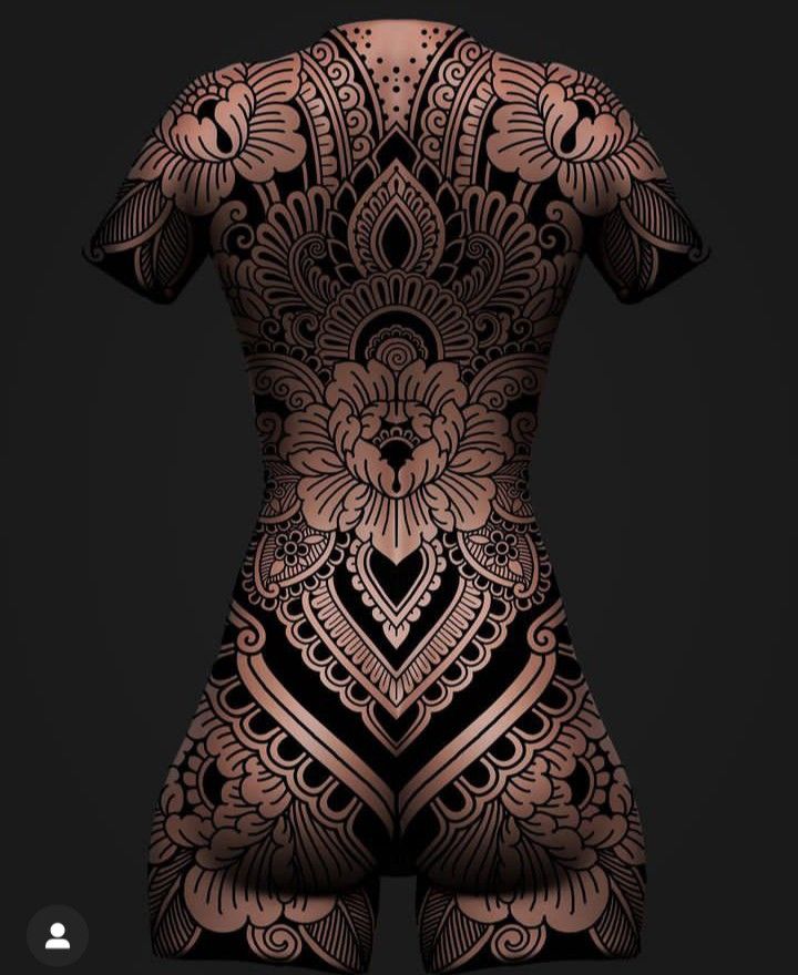 the back of a woman's body, with intricate designs on its chest and shoulders