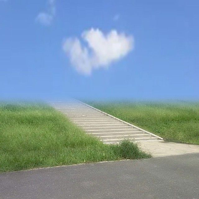 an image of a stairway going up to the sky with a cloud in the background