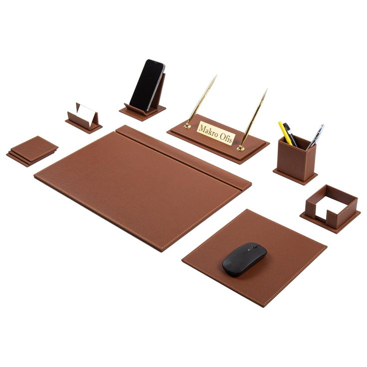 a computer mouse, pen holder, and other office supplies