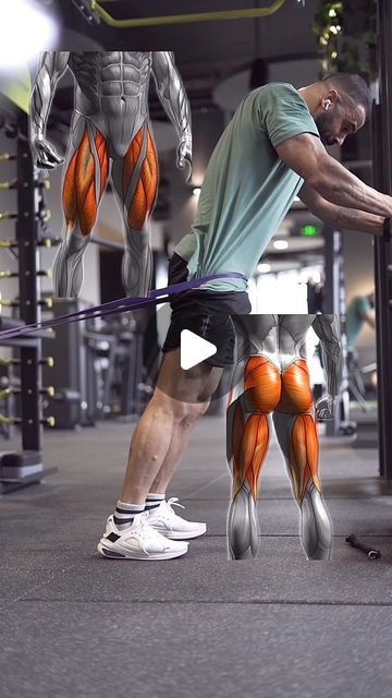 an image of a man doing pull ups in the gym with his legs spread out