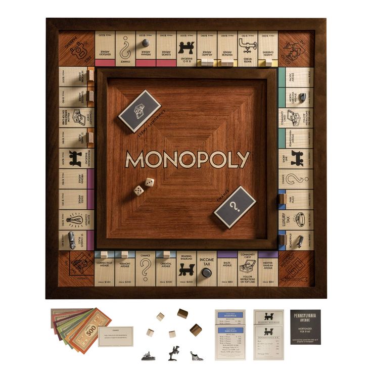 the monopoly board game is shown with pieces of paper and dices on top of it