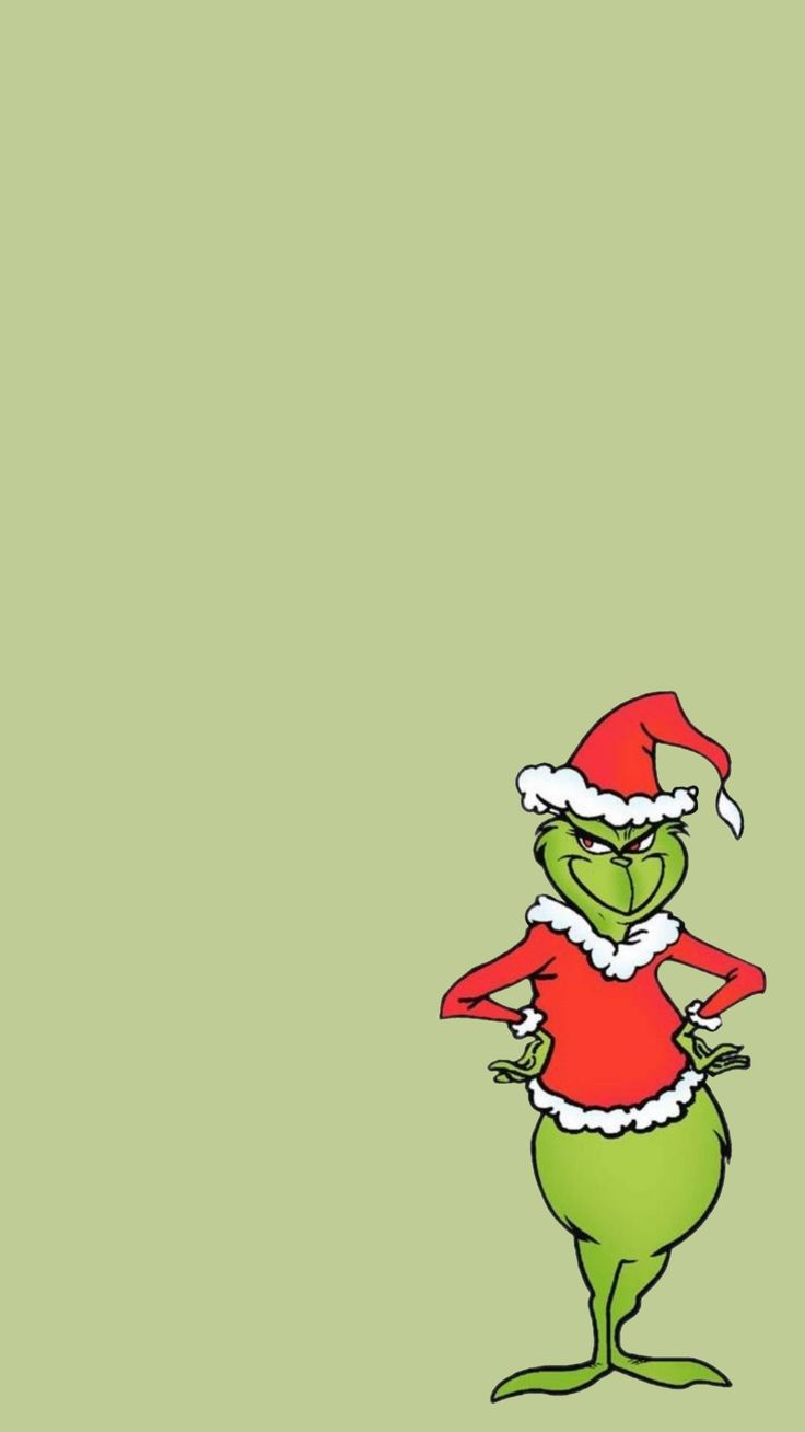 the grinch is wearing a santa hat