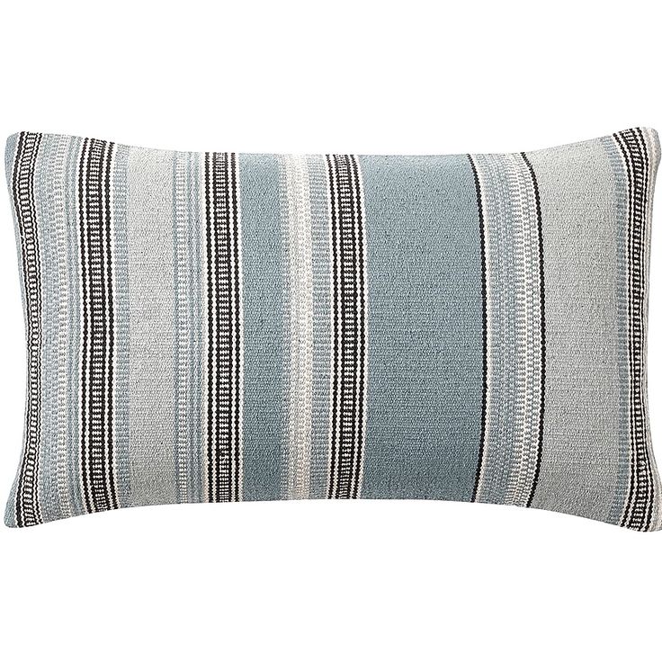 a blue and white striped pillow on a white background