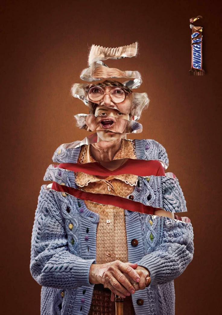 an old woman wearing glasses and holding a cane in front of her face with ribbons on it