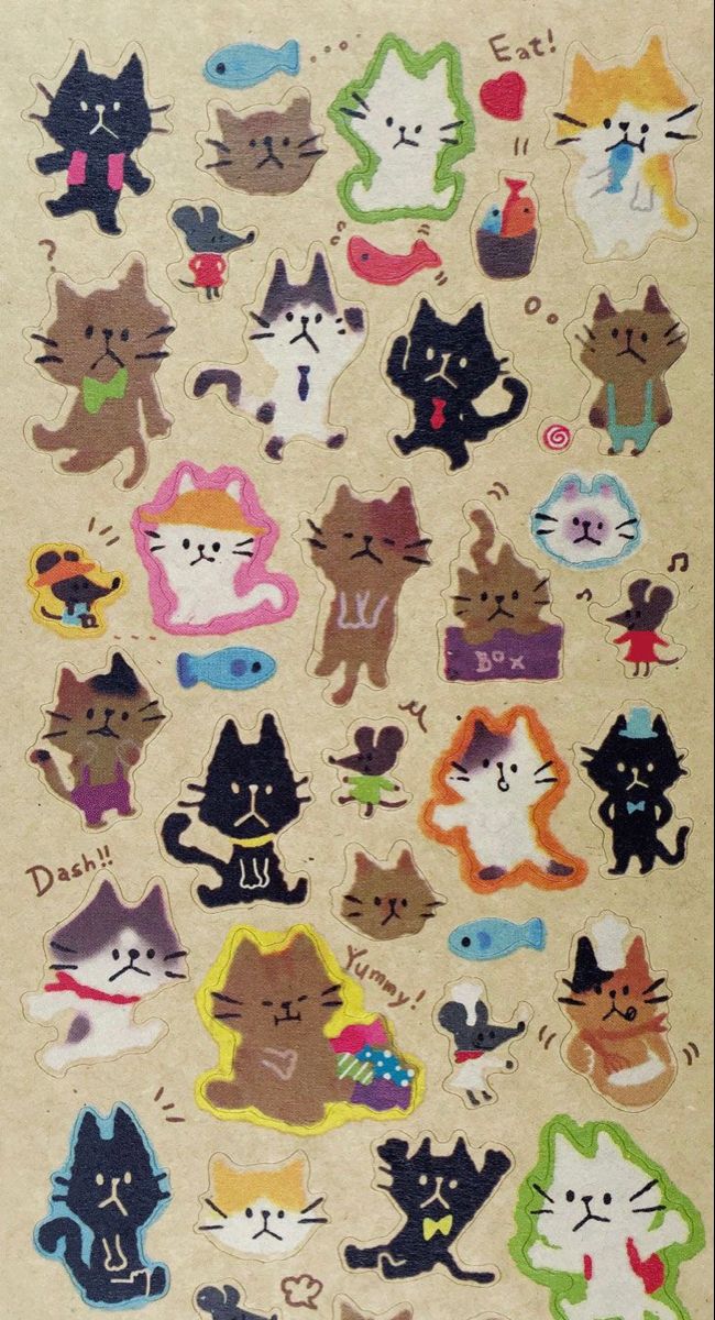 a bunch of stickers that are on top of a piece of paper with cats