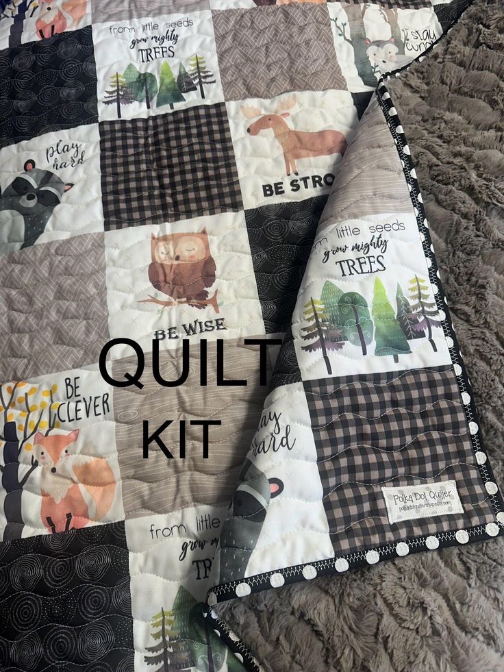 the quilt kit is laying on top of the bed