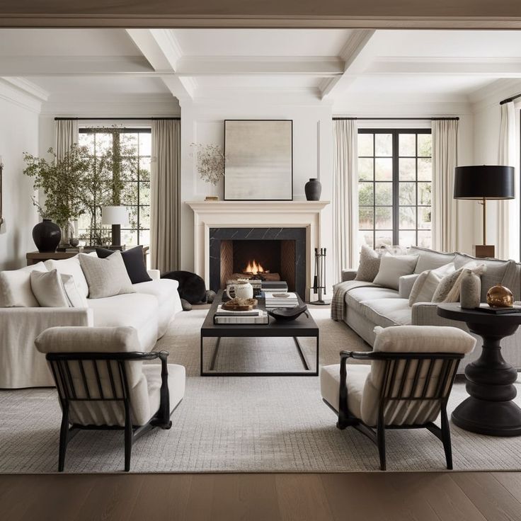 a living room filled with furniture and a fire place in the middle of a room