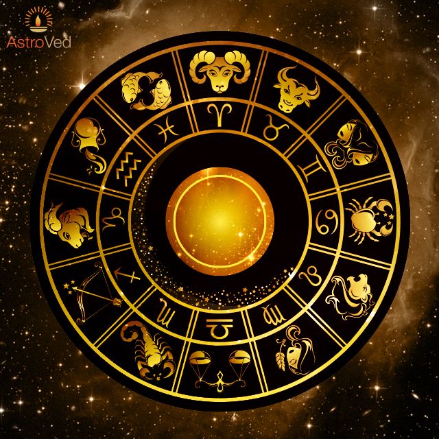 zodiac signs and astro symbols on a black circle with gold trimmings in the center