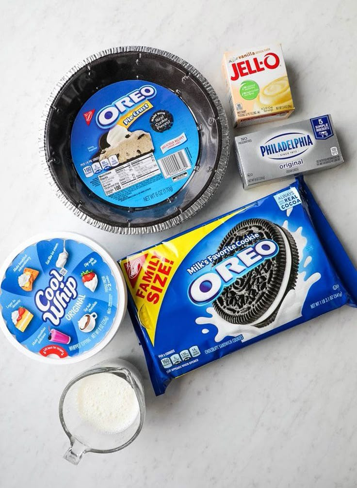 ingredients to make oreo cookies laid out on a table