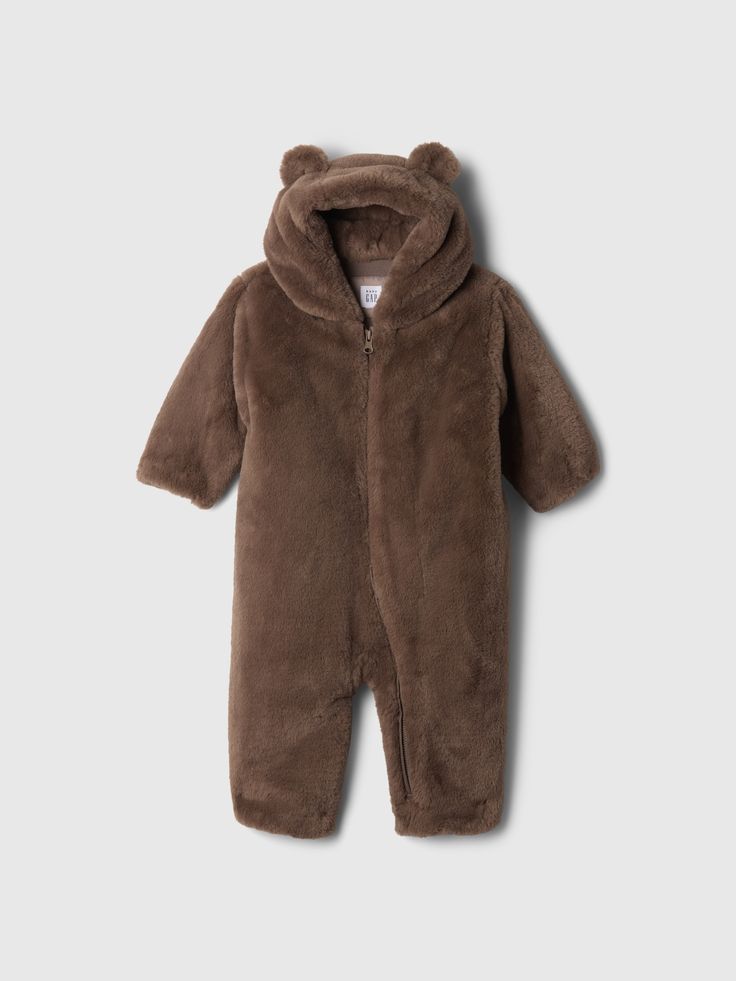 Soft, faux fur one-piece.  Hooded neckline with bear ear appliques.  Long sleeves.  Zipper front.  Jersey lining.  For more fit and sizing info, check out our Size Guide. Newborn Bear Costume, Baby In Bear Onesie, Baby Bear Onsie, Newborn Bear Outfit, Baby Bear Outfit, Bear Pajamas Baby, Bear Costume, Bear Ears, Toddler Christmas