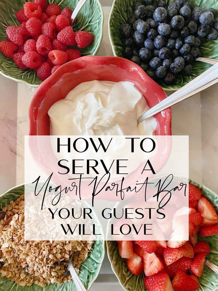 four bowls with strawberries, berries and yogurt in them on a table