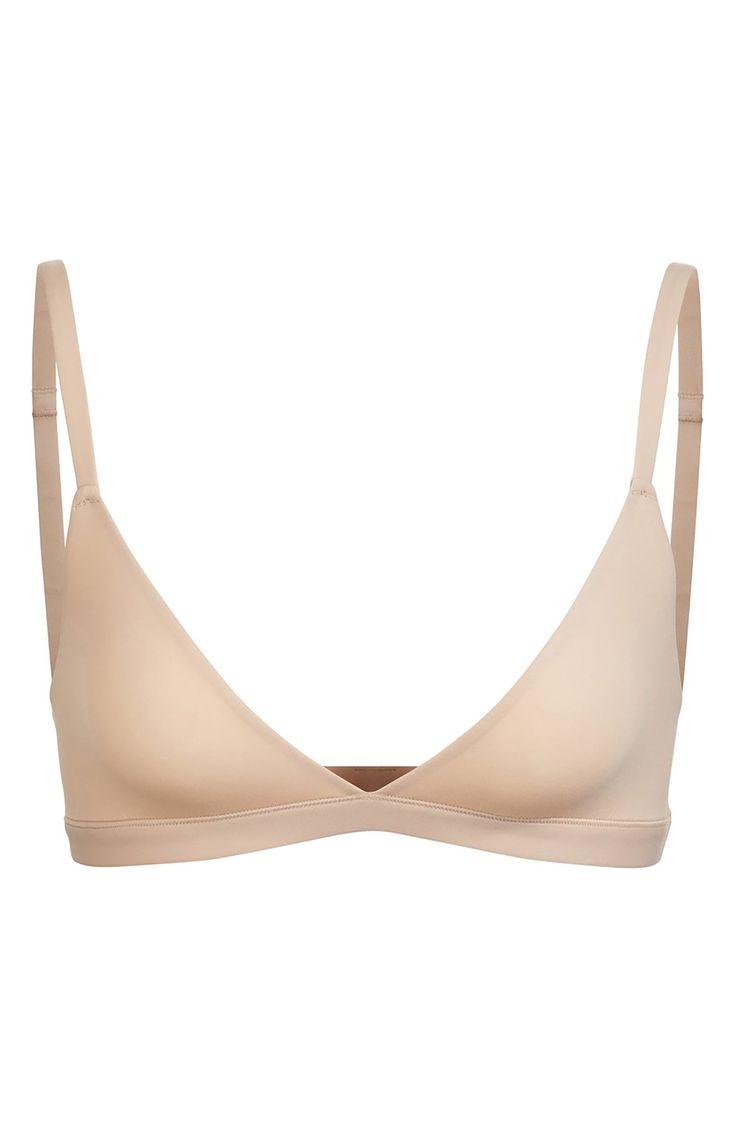 Enjoy the comfort of a bralette while retaining the breathability of quick-dry fabric with this comfortable option from Kim Kardashian West's SKIMS. Available in nine different shades, this second-skin triangle bra offers natural support and comfort while you read, lounge and sleep. Style Name:Skims Fits Everybody Triangle Bralette (Regular & Plus Size). Style Number: 6016426. Available in stores. Wardrobe Makeover, Bday Wishlist, 2024 Christmas, Triangle Bralette, Plus Size Style, Triangle Bra, Window Shopping, Clothing Sets, Second Skin