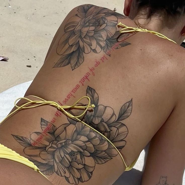 Red And Black Back Tattoo, Spine Tattoo With Flowers, Large Side Tattoos Women, Lily Tattoo Back, Big Arm Tattoos Women, Large Hip Tattoos Women, Shaded Tattoos Women, Flower Tattoos On Back, Big Back Tattoos For Women