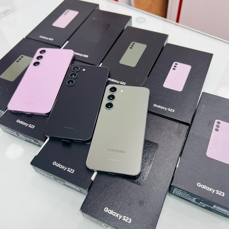 several different models of cell phones on display