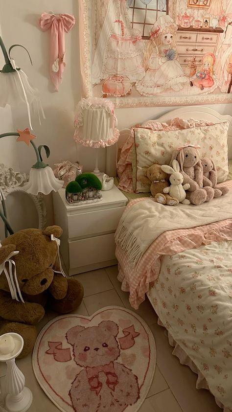 a bed room with a neatly made bed and teddy bears