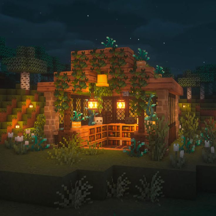 a small house in the middle of a forest at night with lights on and plants growing all around