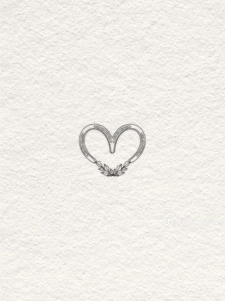 a drawing of two hearts with leaves in the middle