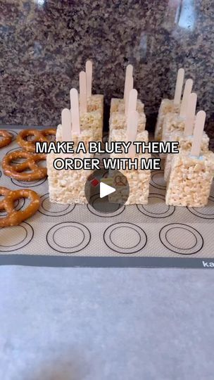 donuts and pretzels on a tray with the words make a bluey theme order with me