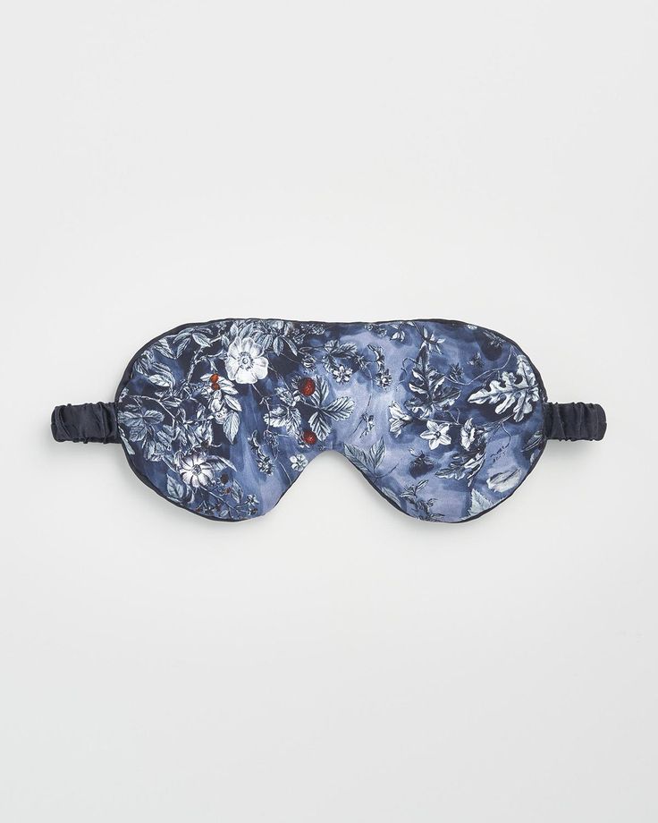 Add a touch of luxury to your nightly repose with our Nocturnal Garden Sleep Mask in Midnight Blue. Printed with a classic tale of nature that sets the scene for a fairytale slumber. The print features on both sides offering versatility to wear how you wish. Carefully crafted from Lyocell, a sustainable fabric made from wood pulp that is kind to sensitive skin, allowing you to drift away in serenity and awaken refreshed and ready to embrace the day.
  Key features:
  One Size
 Ultra soft and bre Fable England, Swan Jewelry, Lyocell Fabric, Cottage Quilt, Fox Jewelry, Luxury Christmas Gifts, Talisman Necklace, Sustainable Fabric, Animal Brooch