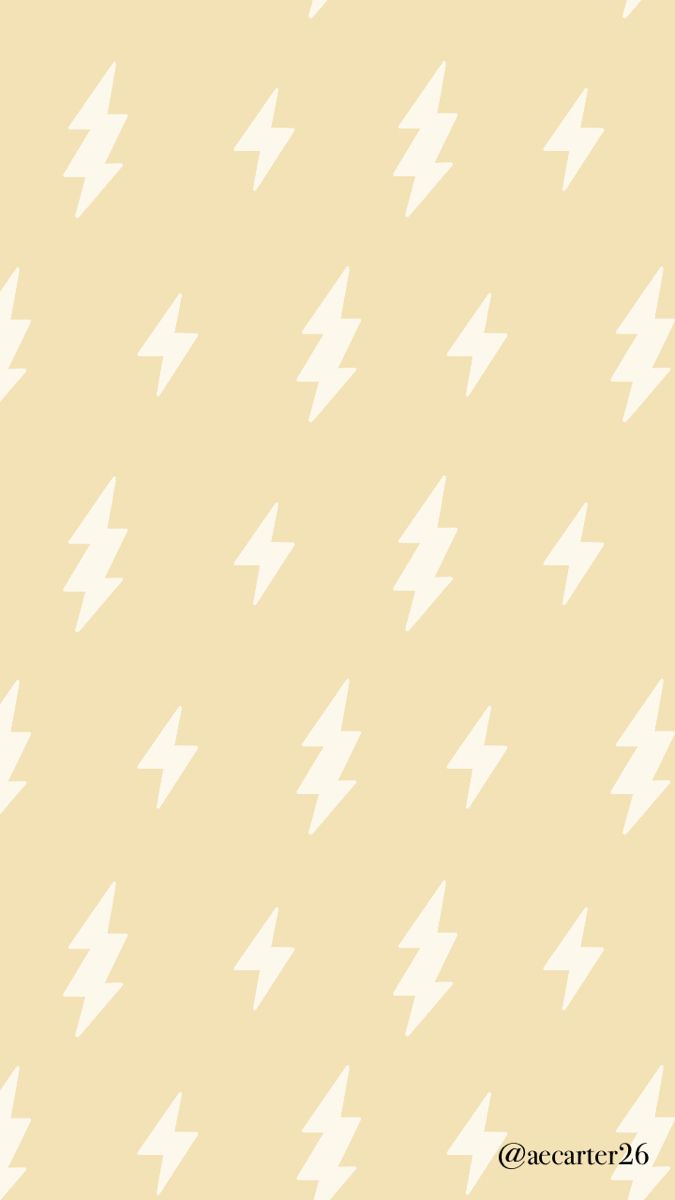 a beige background with white lightnings on it